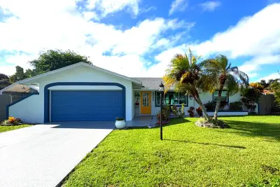 3080 Tropical Trl, Atlantis: photo 1 of 45