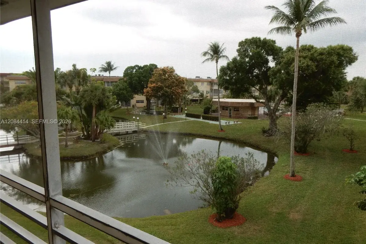 5051 W Oakland Park Blvd #302, Lauderdale Lakes: photo 1 of 59