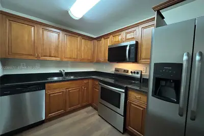 700 NW 214th St #116, Miami Gardens: photo 1 of 14