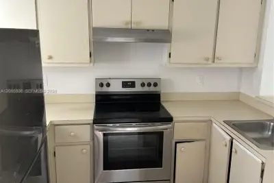8730 N Sherman Cir #308, Miramar: photo 1 of 11