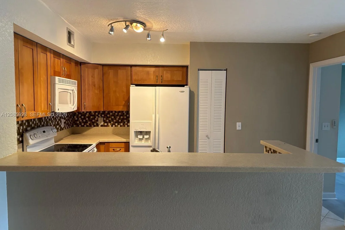 1721 Village Blvd #205, West Palm Beach: photo 1 of 18