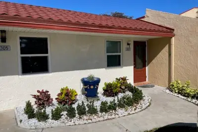 307 Lake Evelyn Dr, West Palm Beach: photo 1 of 58