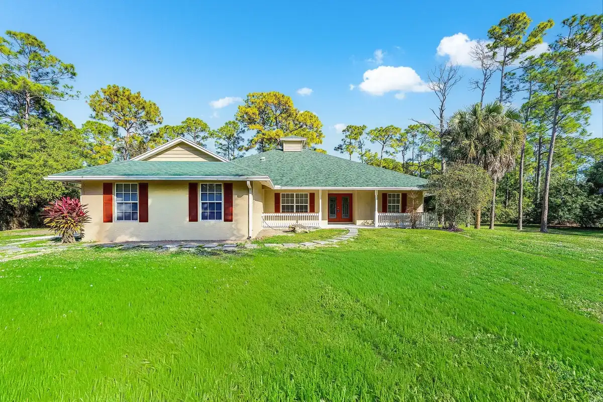 17109 Murcott Blvd, The Acreage: photo 1 of 43