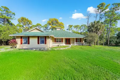 17109 Murcott Blvd, The Acreage: photo 1 of 43