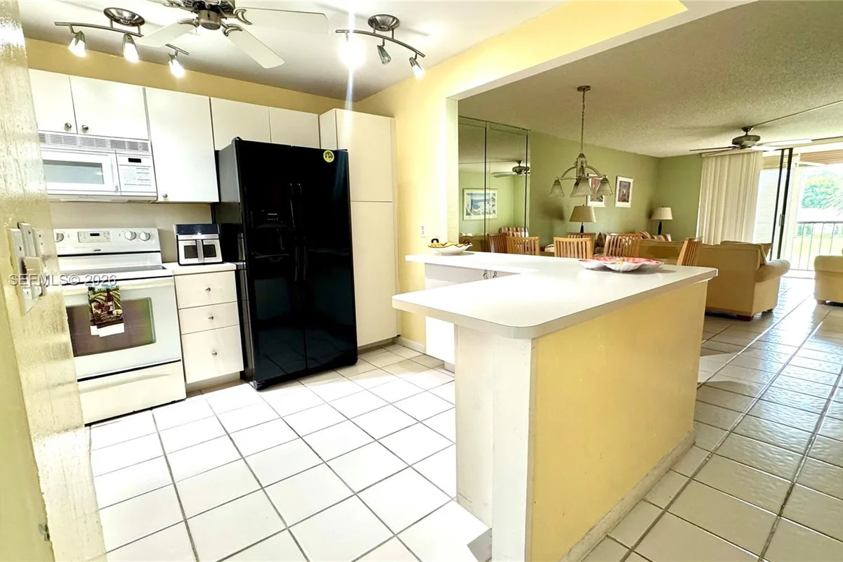 2420 S Deer Creek Country Club Blvd #207-D, Deerfield Beach: photo 1 of 15