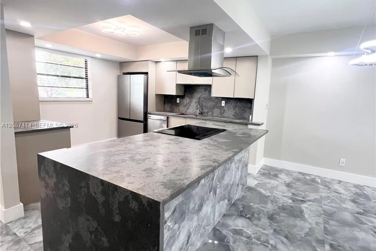 4930 E Sabal Palm Blvd #206, Tamarac: photo 1 of 65