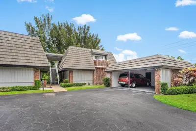 408 Pine Tree Ct #12, Atlantis: photo 1 of 22