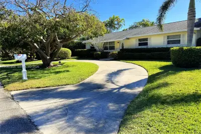 2448 Holly Ln, Palm Beach Gardens: photo 1 of 54