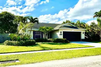1259 Denlow Ln, Royal Palm Beach: photo 1 of 73