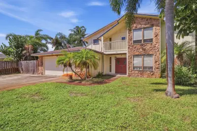 596 Greenwood Dr, Jupiter: photo 1 of 45
