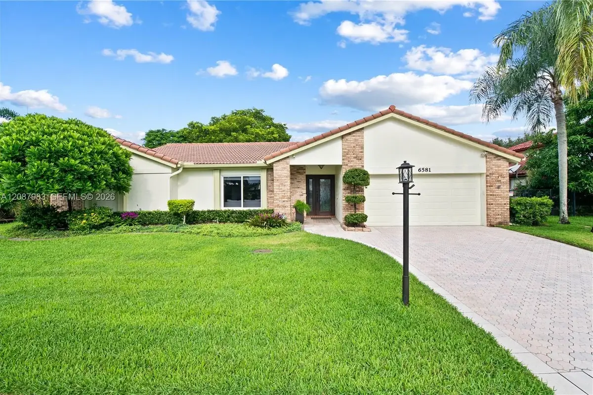 6581 Falconsgate Ave, Davie: photo 1 of 48