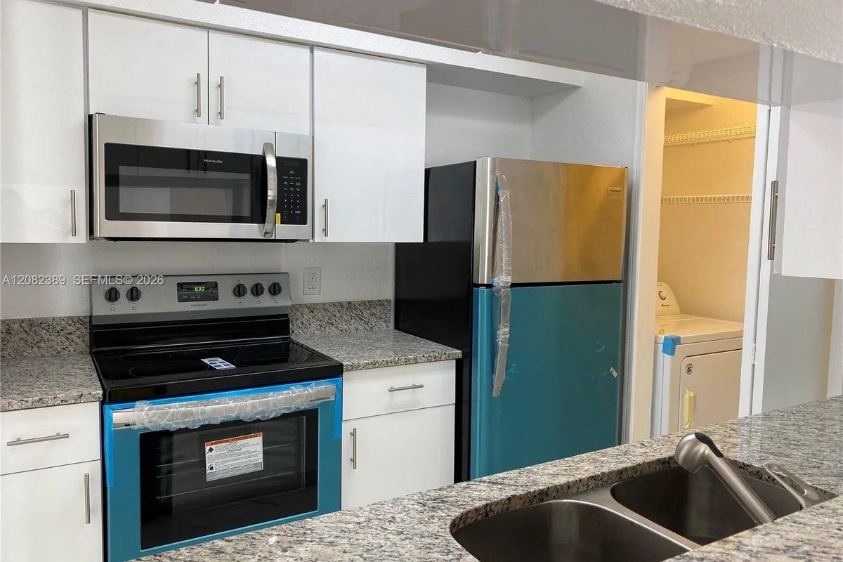 733 Riverside Dr #1212, Coral Springs: photo 1 of 49