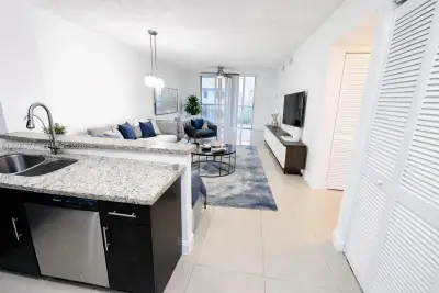 8730 N Sherman Cir #302, Miramar: photo 1 of 21