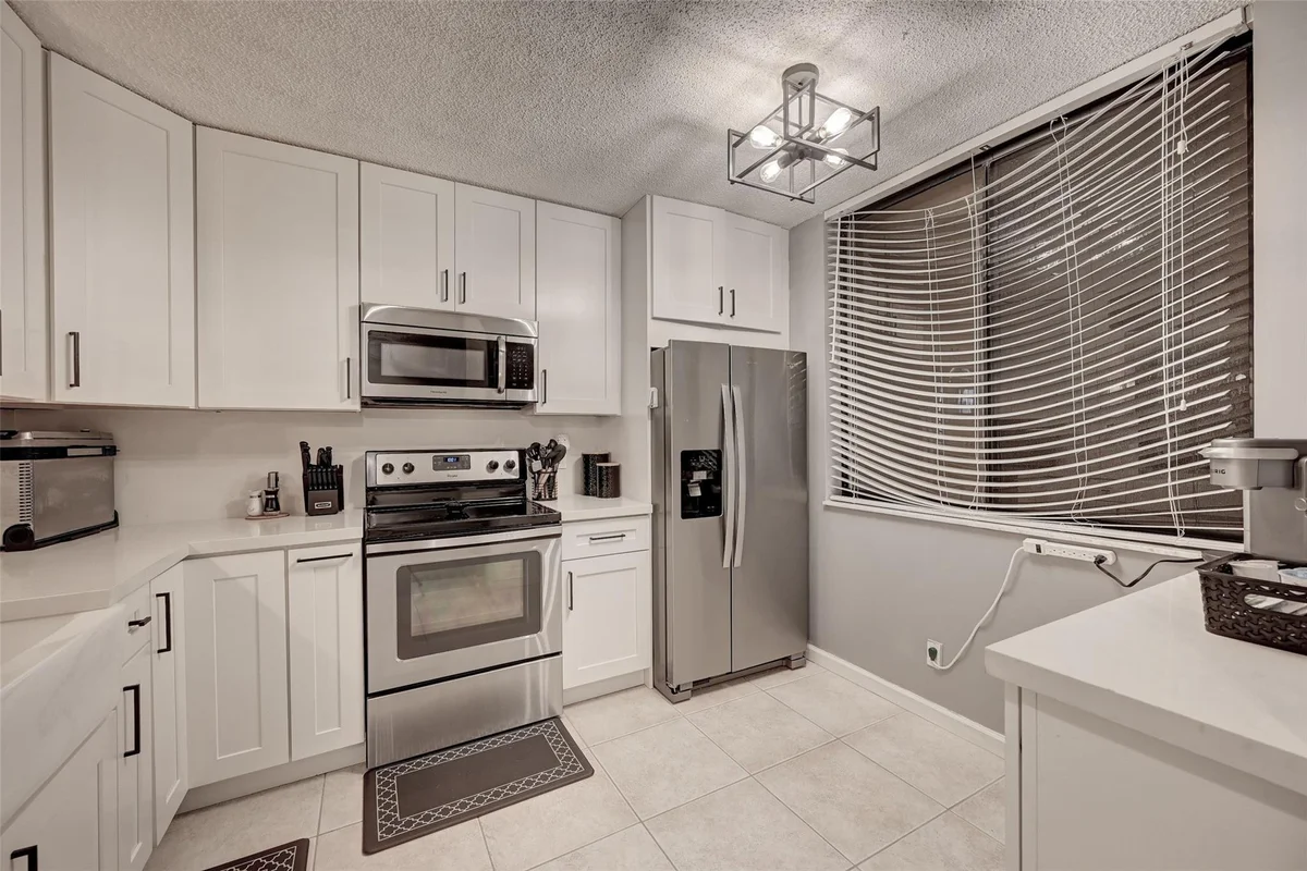 8592 W Sunrise Blvd #206, Plantation: photo 1 of 21