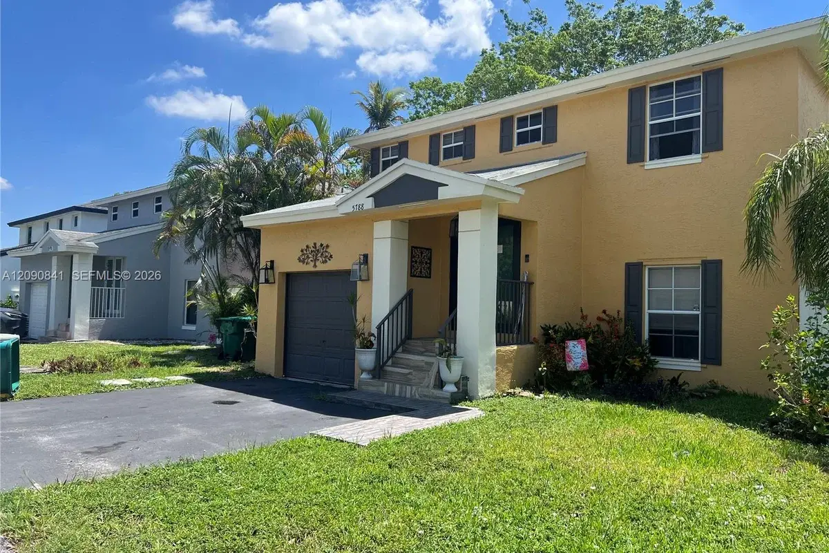 5788 Woodland Point Dr, Tamarac: photo 1 of 30