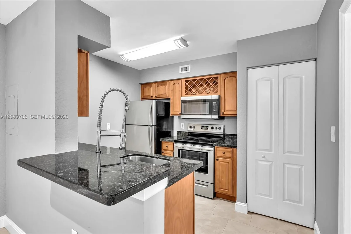 2820 N Oakland Forest Dr #102, Oakland Park: photo 1 of 75