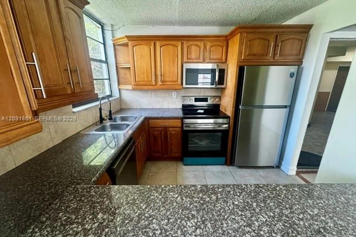 1754 NW 55th Ave #204, Lauderhill: photo 1 of 15