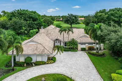 9 Alnwick Rd, Palm Beach Gardens: photo 1 of 44