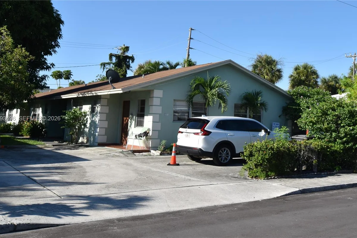 418 Conniston Rd, West Palm Beach: photo 1 of 52