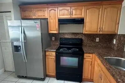 911 NE 209th Ter #102-27, Miami: photo 1 of 15