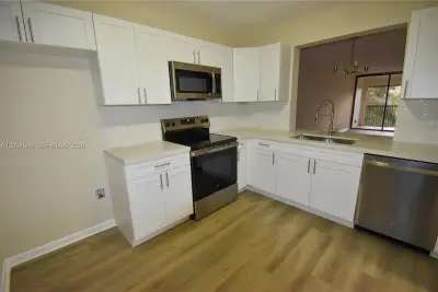 8592 W Sunrise Blvd #303, Plantation: photo 1 of 19