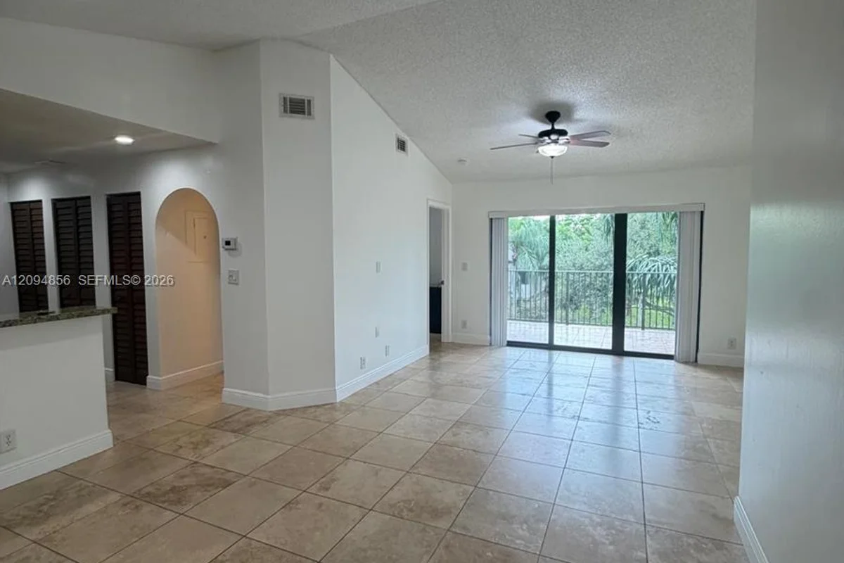 10125 W Sunrise Blvd #303, Plantation: photo 1 of 25