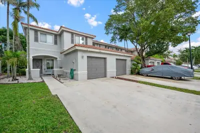 7108 Hawks Nest Ter, Riviera Beach: photo 1 of 47