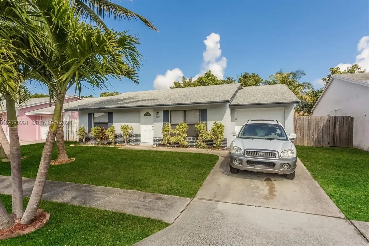5990 W Ithaca Cir W, Lake Worth: photo 1 of 15