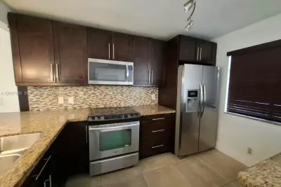 320 Racquet Club Rd #104, Weston: photo 1 of 36