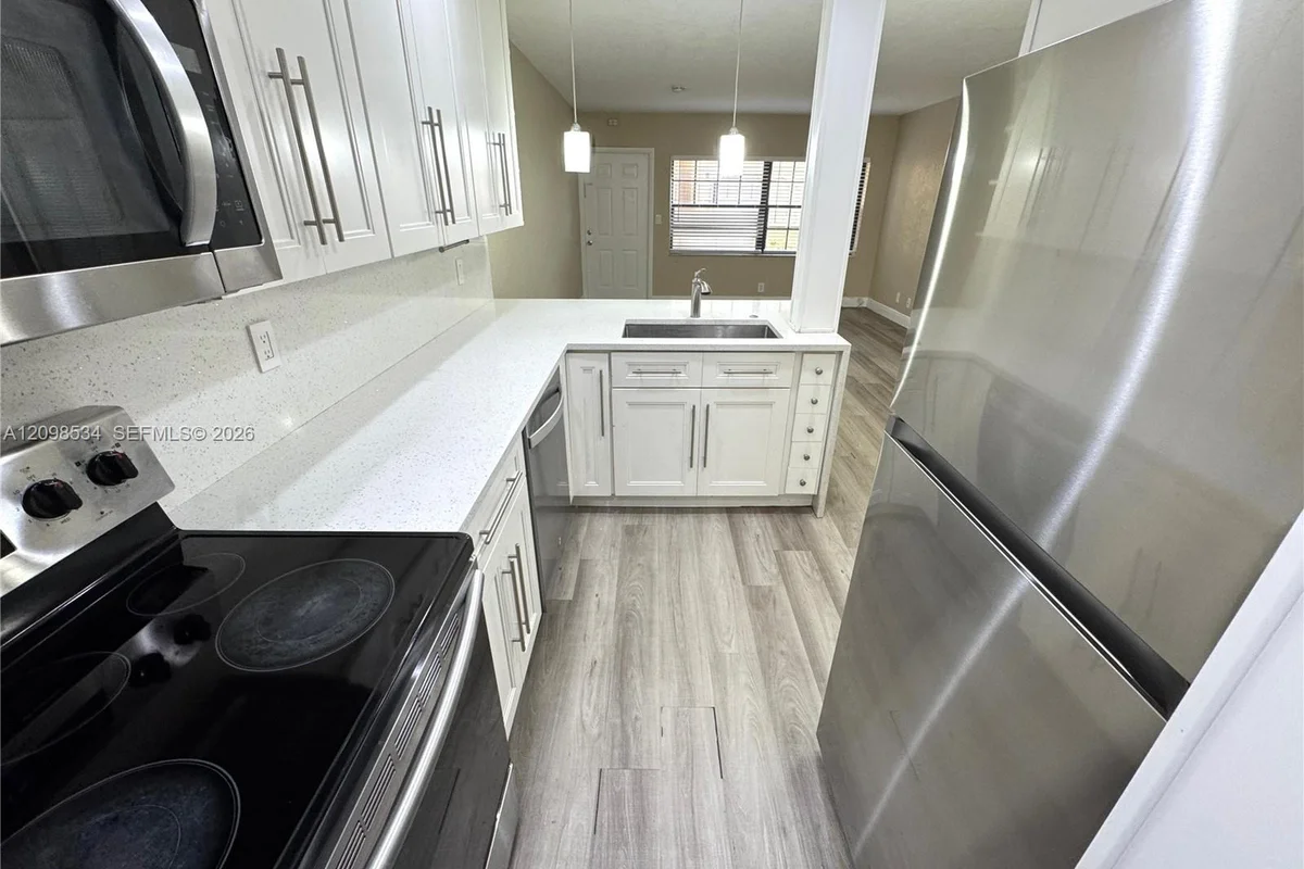2626 Riverside Dr, Coral Springs: photo 1 of 10