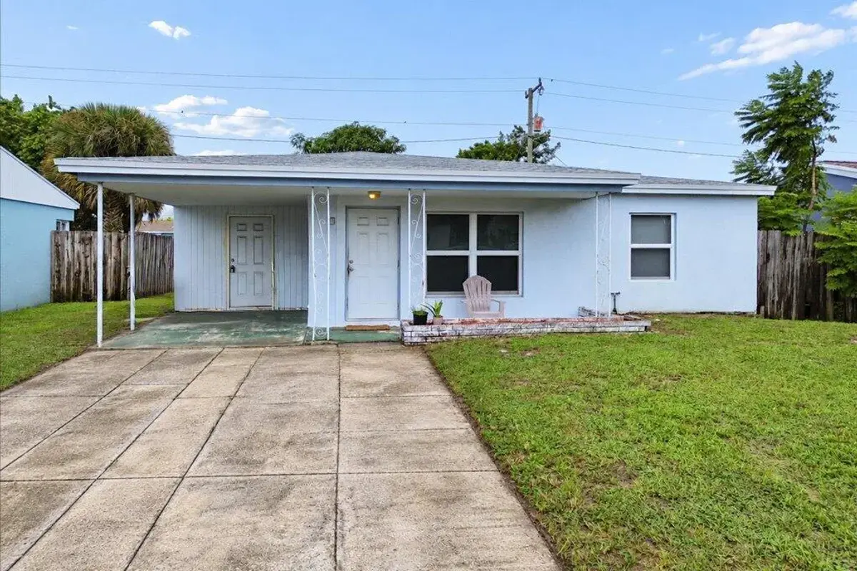 411 NW 52nd St, Oakland Park: photo 1 of 25