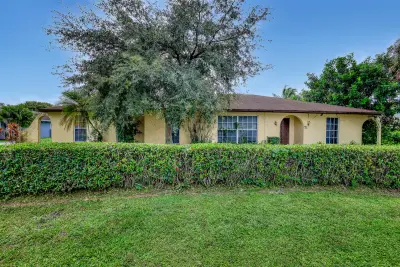 110 Meadowlark Dr, Royal Palm Beach: photo 1 of 56