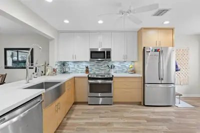 3329 Deer Creek Lake Shore Dr, Deerfield Beach: photo 1 of 36