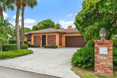 324 Sandal Ln, Palm Beach Shores: photo 1 of 59