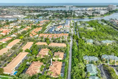 106 Renaissance Dr, North Palm Beach: photo 1 of 31