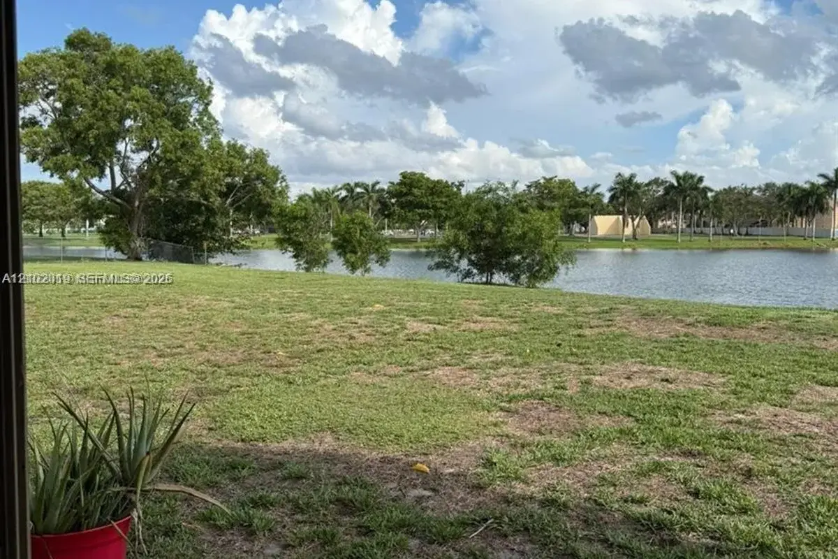 8560 N Sherman Cir #105, Miramar: photo 1 of 14