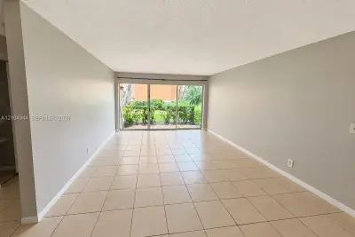 8821 Wiles Rd #102, Coral Springs: photo 1 of 27