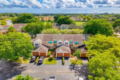 7105 Woodmont Way, Tamarac: photo 1 of 57