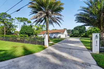 8895 Palomino Dr, Lake Worth: photo 1 of 75