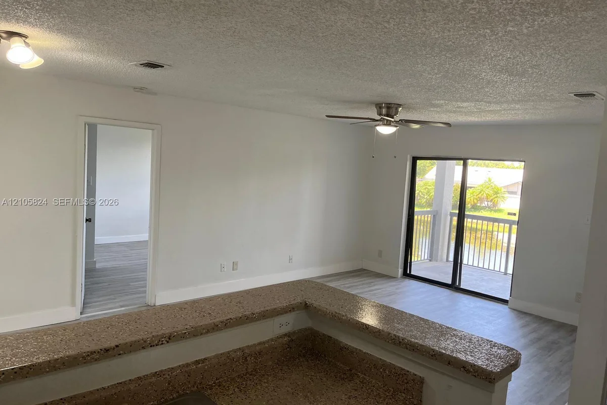 11233 W Atlantic Blvd #207, Coral Springs: photo 1 of 18