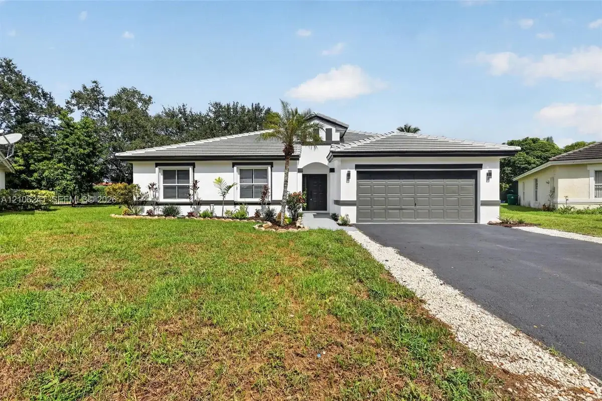 9407 SW 18th St, Miramar: photo 1 of 44