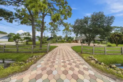 15107 97th Rd N, The Acreage: photo 1 of 59