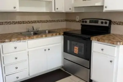 5701 SW 27th St #1, West Park: photo 1 of 12