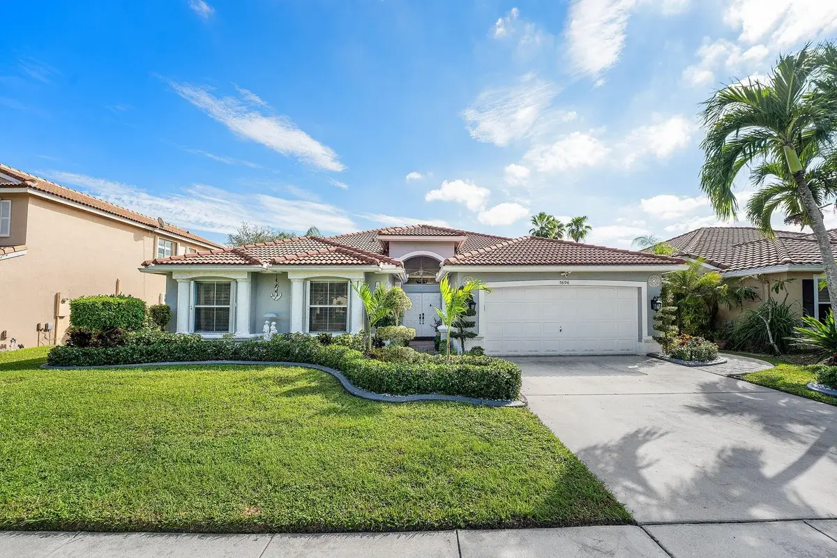 5696 Muirfield Village Cir, Lake Worth: photo 1 of 63