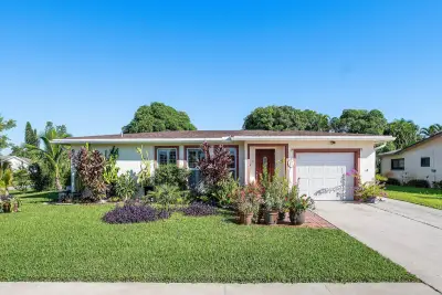 6395 Whispering Wind Way, Delray Beach: photo 1 of 44