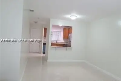 6061 Shakerwood Cir #202, Tamarac: photo 1 of 8