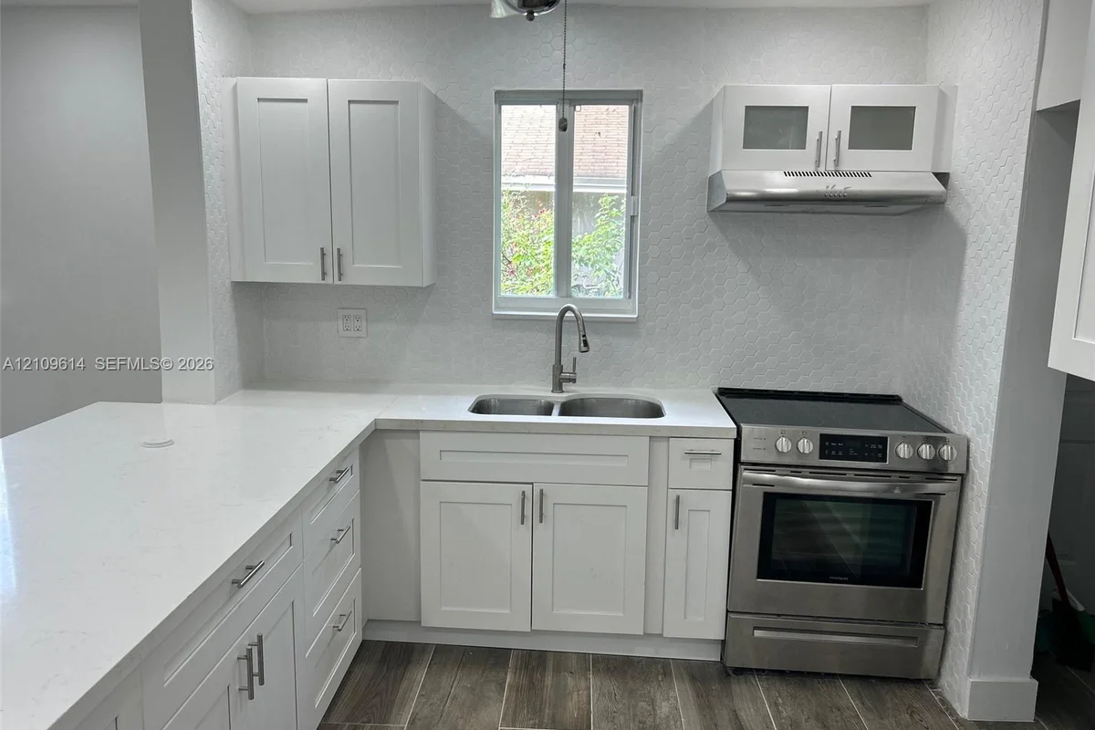 261 NW 49th St #A, Miami: photo 1 of 55