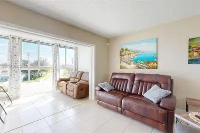 7877 Golf Cir Dr #304, Margate: photo 1 of 58
